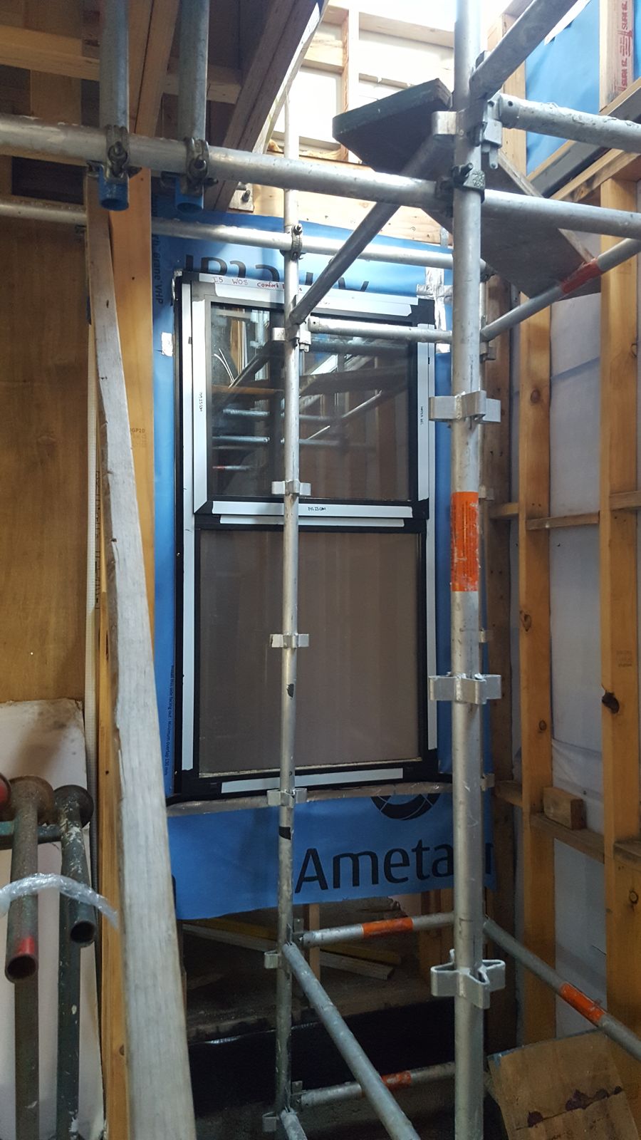 Window fitted and taped against the external wall wrap
