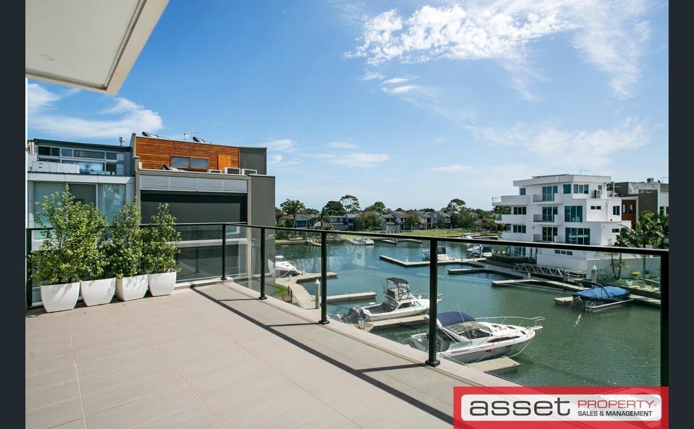 Balcony overlooking the marina at a Patterson Lakes home